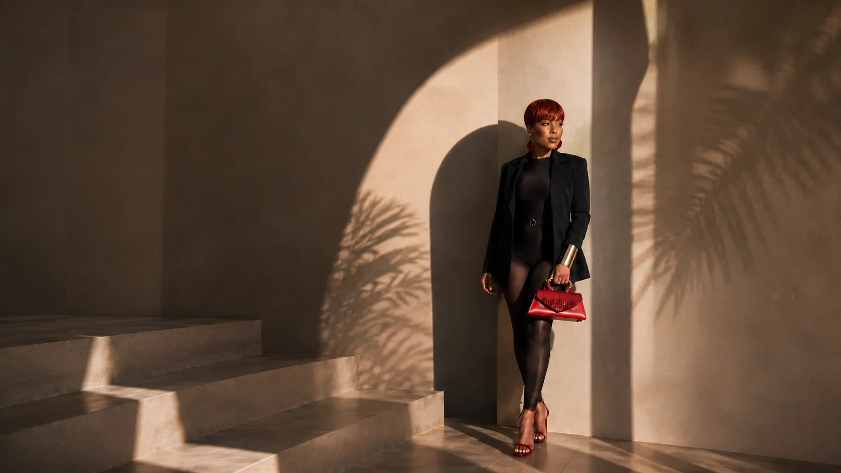 Editorial black bodysuit and blazer look